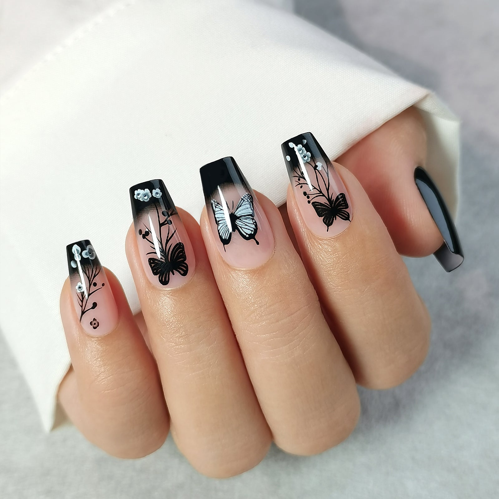 Noir Papillon – M Coffin