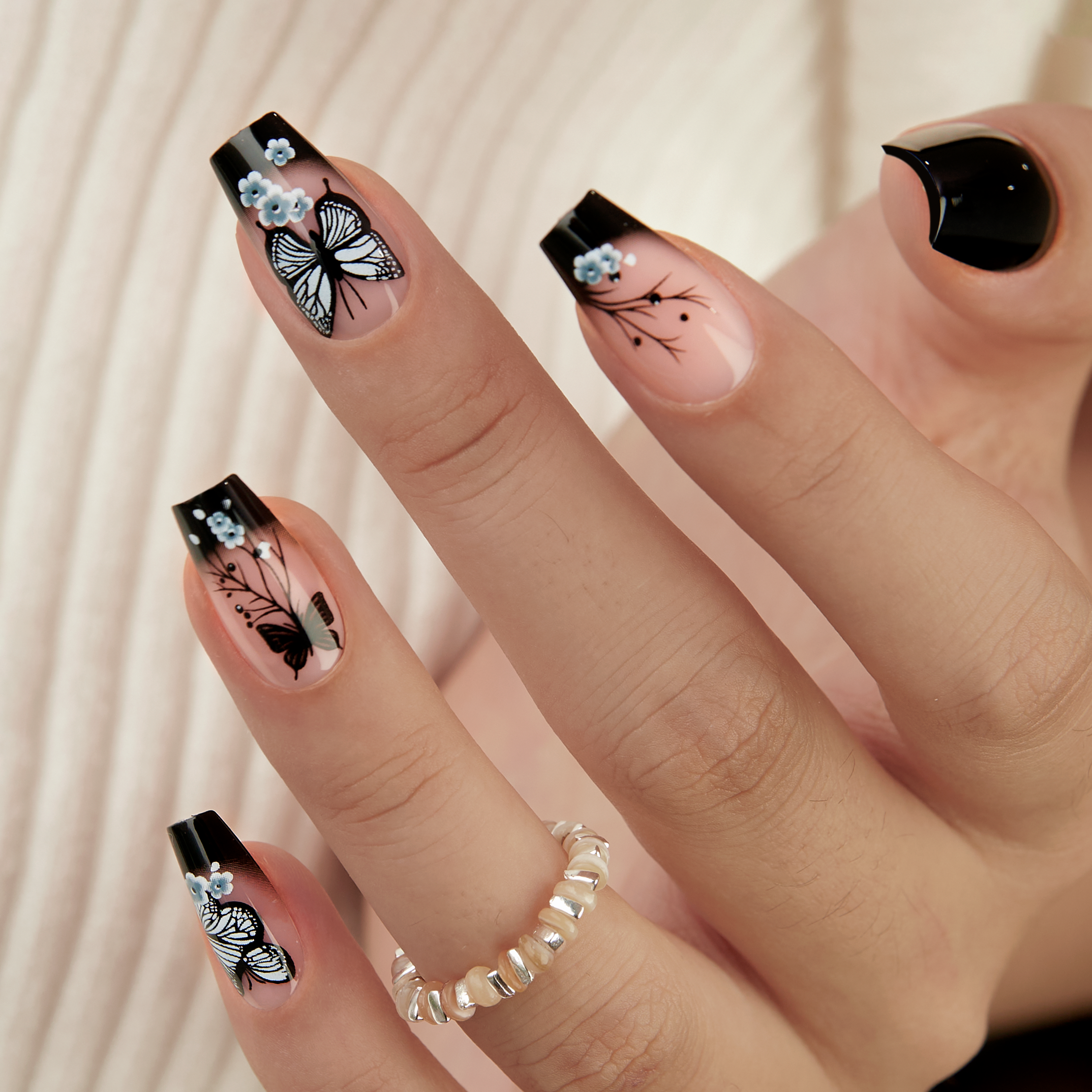 Noir Papillon – M Coffin