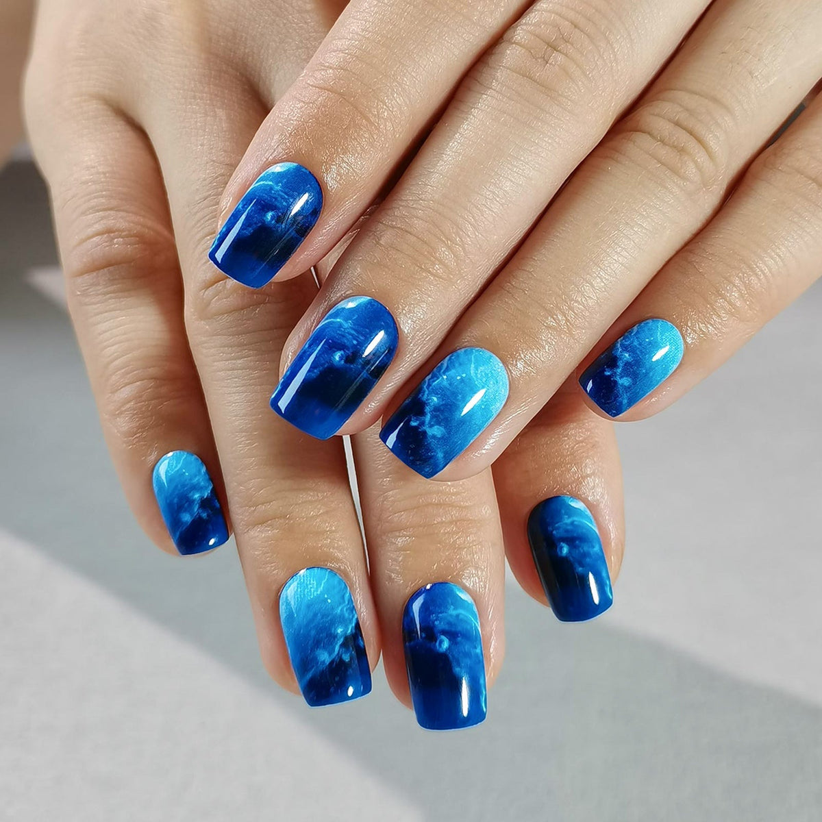 Blue Cosmos Press-On Nails – Medium Squoval Deep Blue Sky Blue Marble Fluid Art Dreamy